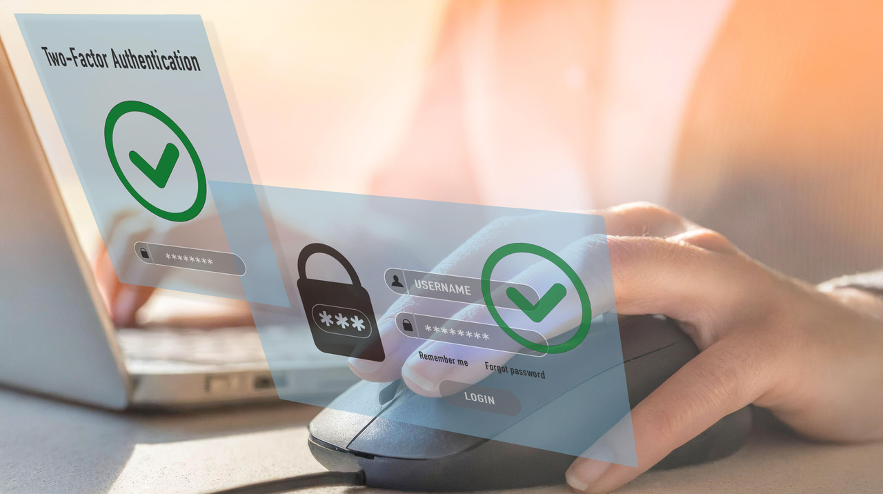 Mobile phone depicting MFA to laptop